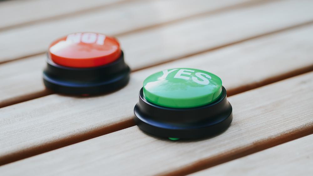 Zwei Buttons, jeweils rot und grün mit den Aufschriften "No" und "Yes".